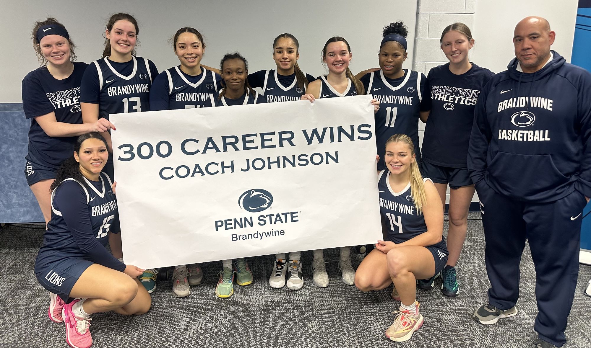 Brandywine women's basketball celebrates Coach Johnson's 300th win