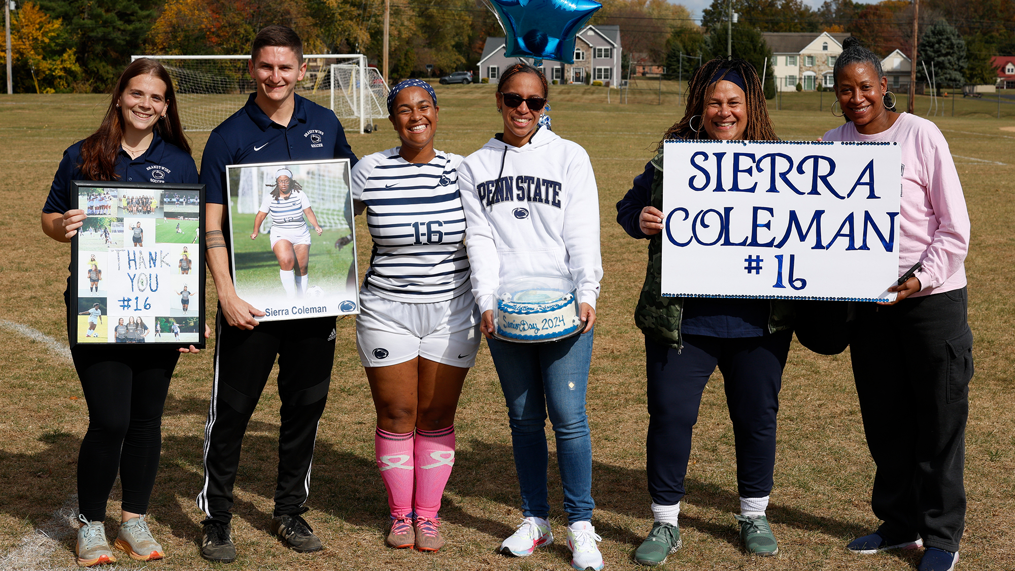 Senior Sierra Coleman with family and coaches